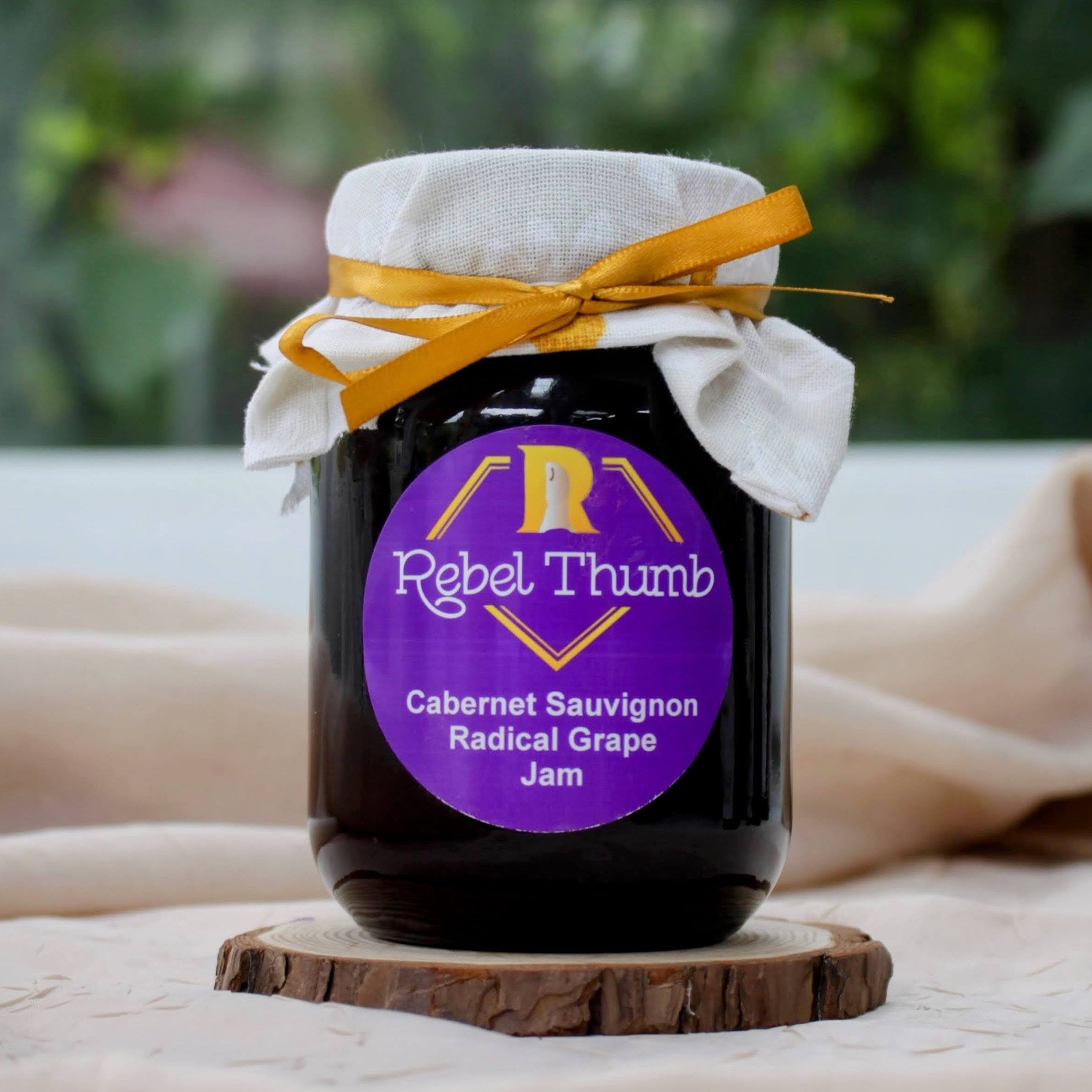 Jar of organic Rebel Thumb seedless Cabernet Sauvignon Radical Grape Jam made in California 