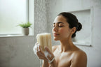 Sustainable, biodegradable and eco-friendly self-care natural loofah (luffa) sponge with an organic cotton hanging cord.